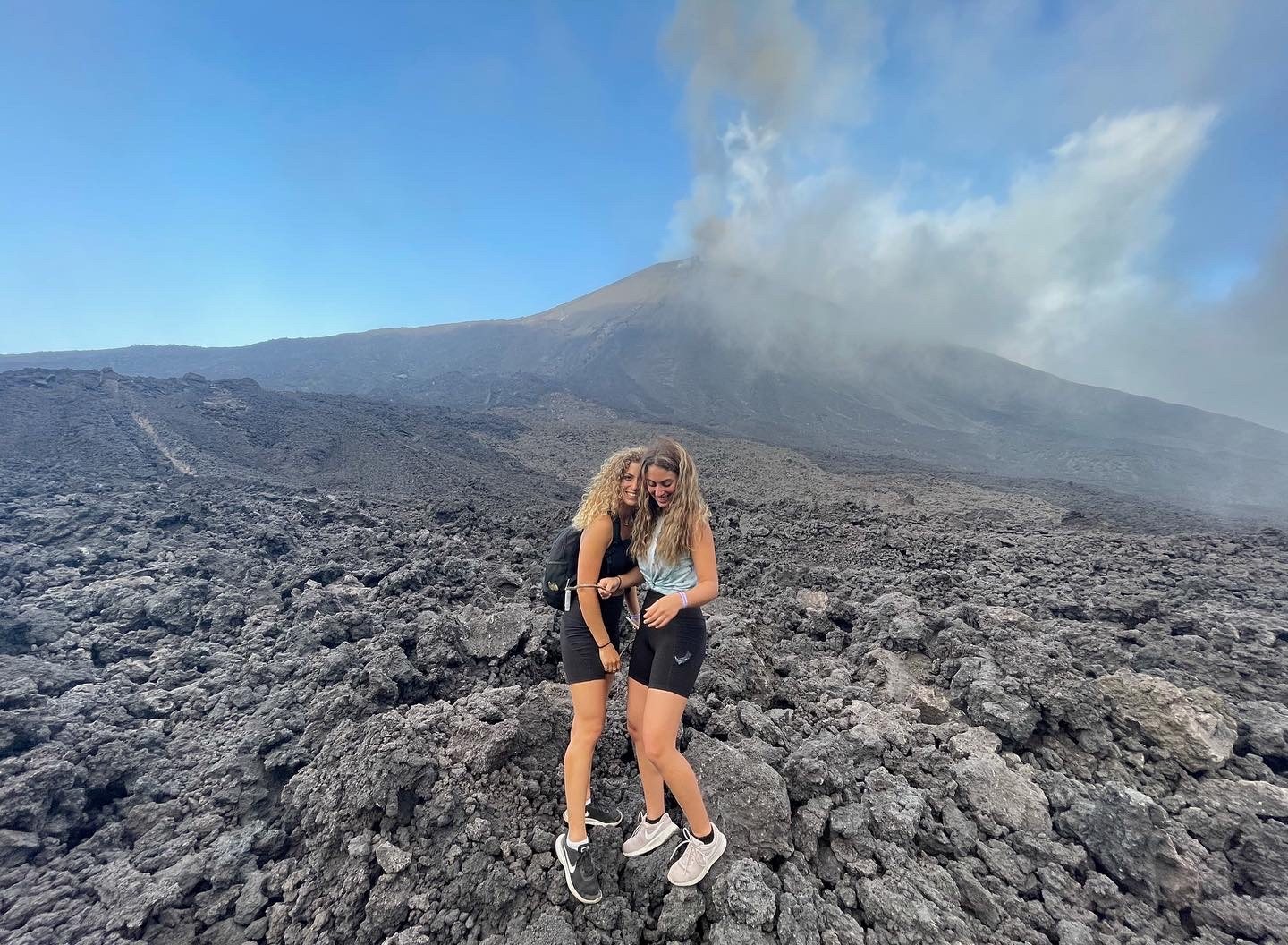 Two travellers sharing a volcanic adventure